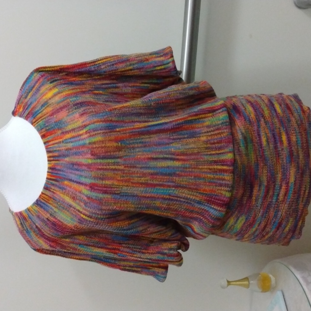 Batwing sleeved unusual sweater.  Can be worn several ways. Medium